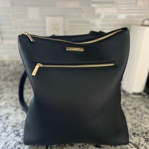 Gorgeous, soft leather backpack style purse. Perfect condition. Lots of room!